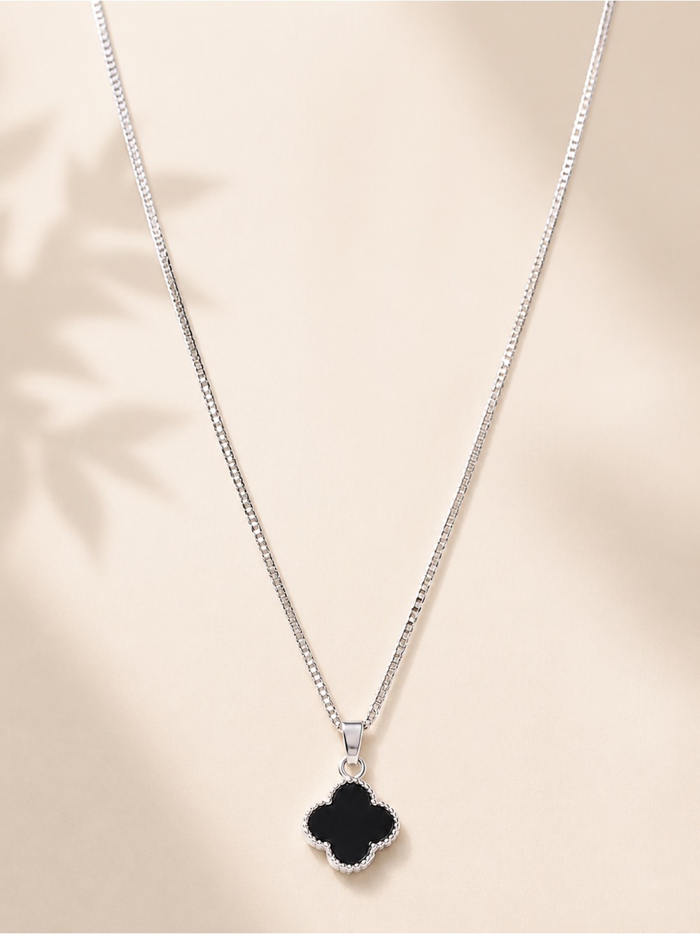 Silver Necklace with Black Clover Pendant